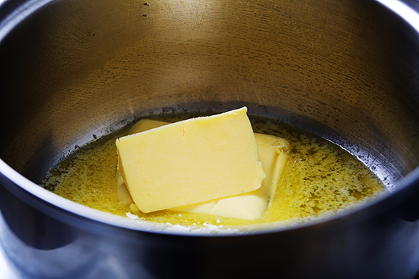 Butter melting in a pan on the stove